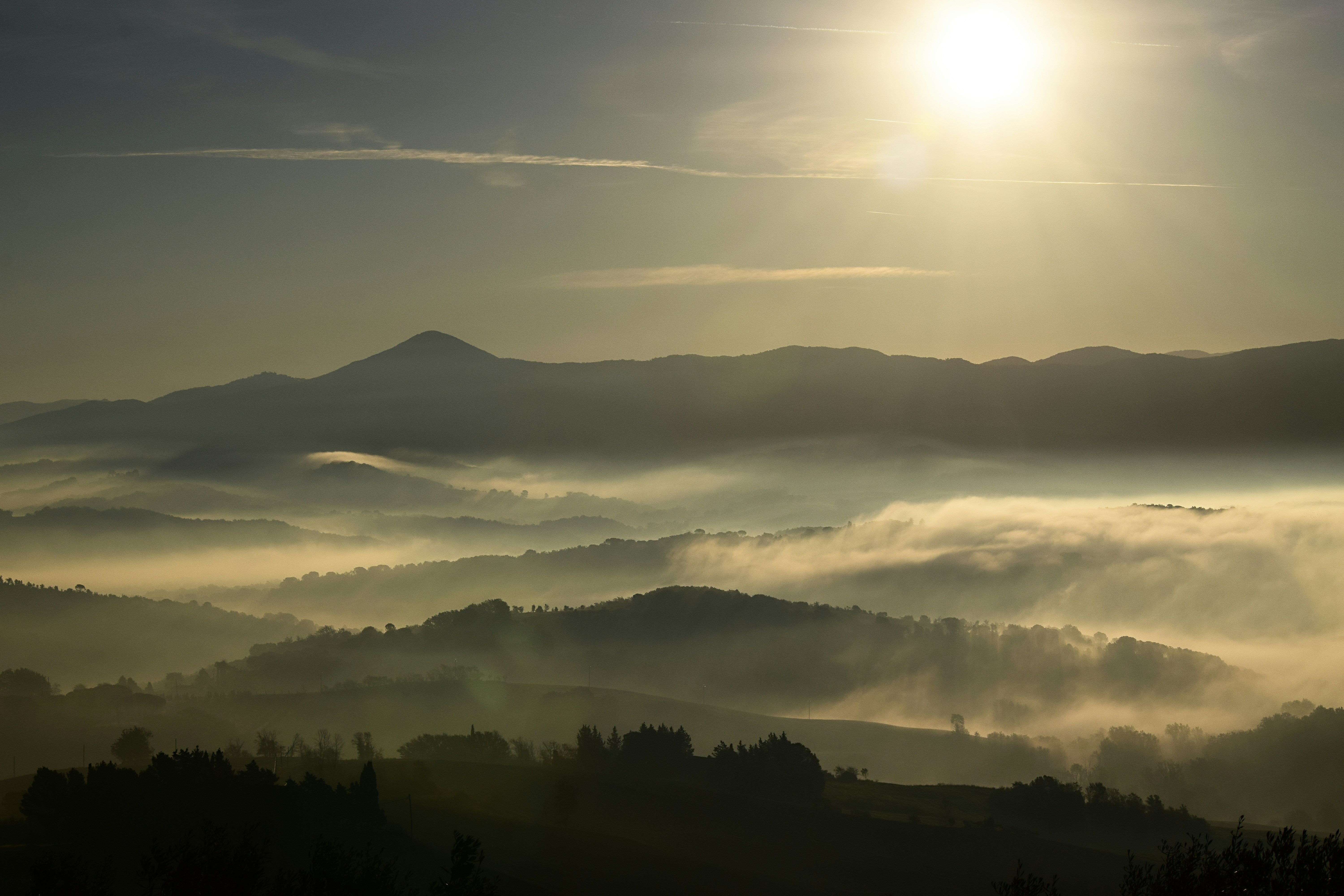 view of mountains with fogs